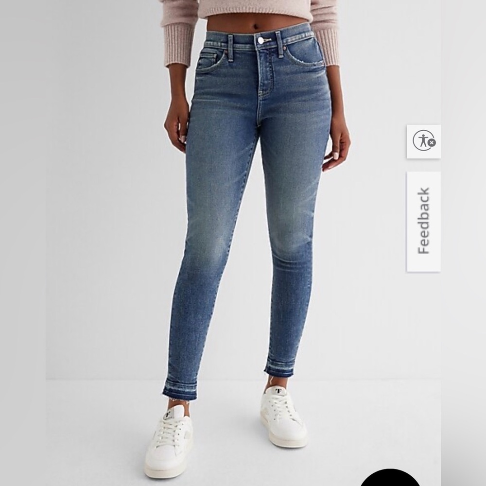 Express Mid Rise Medium Wash Raw Drop Hem Skinny Jeans